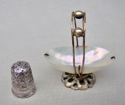 fig 2. DELIGHTFUL CHARLES HORNER SILVER THIMBLE IN MOTHER OF PEARL & ORMULU BASKET, CIRCA 1890