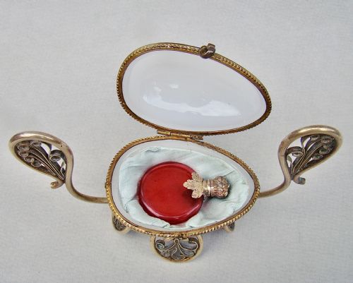 fig 2. RARE 19TH C. FRENCH PALAIS ROYAL CRANBERRY GLASS SCENT BOTTLE IN OPALINE GLASS EGG CASKET, CIRCA 1880
