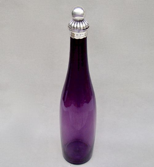 fig 1. RARE VICTORIAN SILVER MOUNTED AMETHYST GLASS DECANTER BY THOMAS STAPLETON, LONDON 1889
