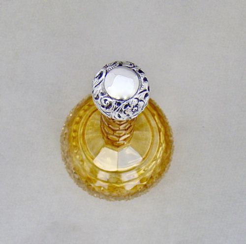 fig 1. RARE VICTORIAN SILVER MOUNTED GRADUATED AMBER CUT GLASS SCENT BOTTLE BY CHARLES MAY, BIRMINGHAM 1898