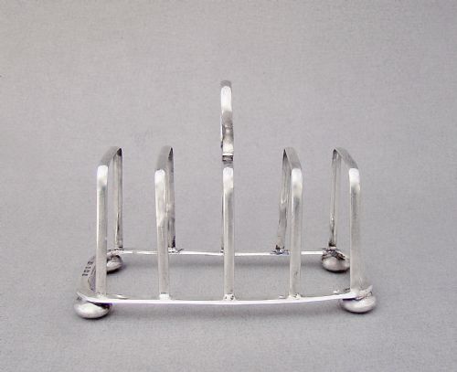 fig 3. ELEGANT EDWARDIAN SILVER TOAST RACK BY JOSEPH GLOSTER, BIRMINGHAM 1908