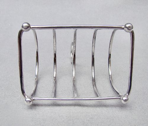 fig 2. GOOD VICTORIAN SOLID SILVER TOAST RACK BY NATHAN & HAYES, CHESTER 1895
