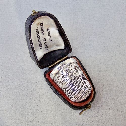 CASED SILVER THIMBLE BY THE NORTHERN GOLDSMITH COMPANY CIRCA 1925