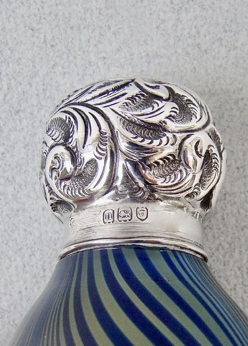 fig 3. UNUSUAL 19TH CENTURY SILVER MOUNTED SWIRLY GLASS SCENT BOTTLE, LONDON 1908
