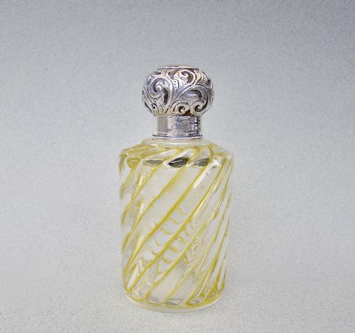 UNUSUAL GEORGE V SILVER MOUNTED YELLOW GLASS COLOGNE BOTTLE BY GEORGE MAY, LONDON 1914