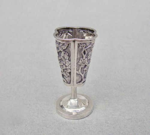 fig 2. A 19th-century Chinese export silver toothpick holder featuring repousse bamboo motifs on a pedestal base with maker hallmarks stamped on the foot rim.