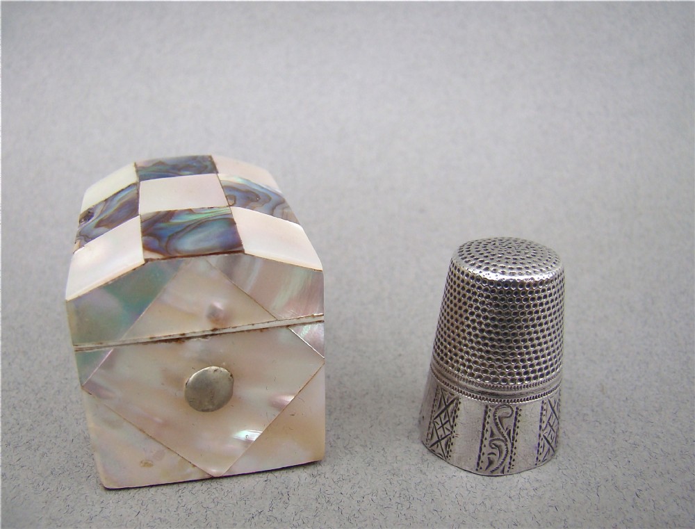 CONTINENTAL SILVER THIMBLE FITTED IN MOTHER OF PEARL & ABALONE CASE, CIRCA 1860