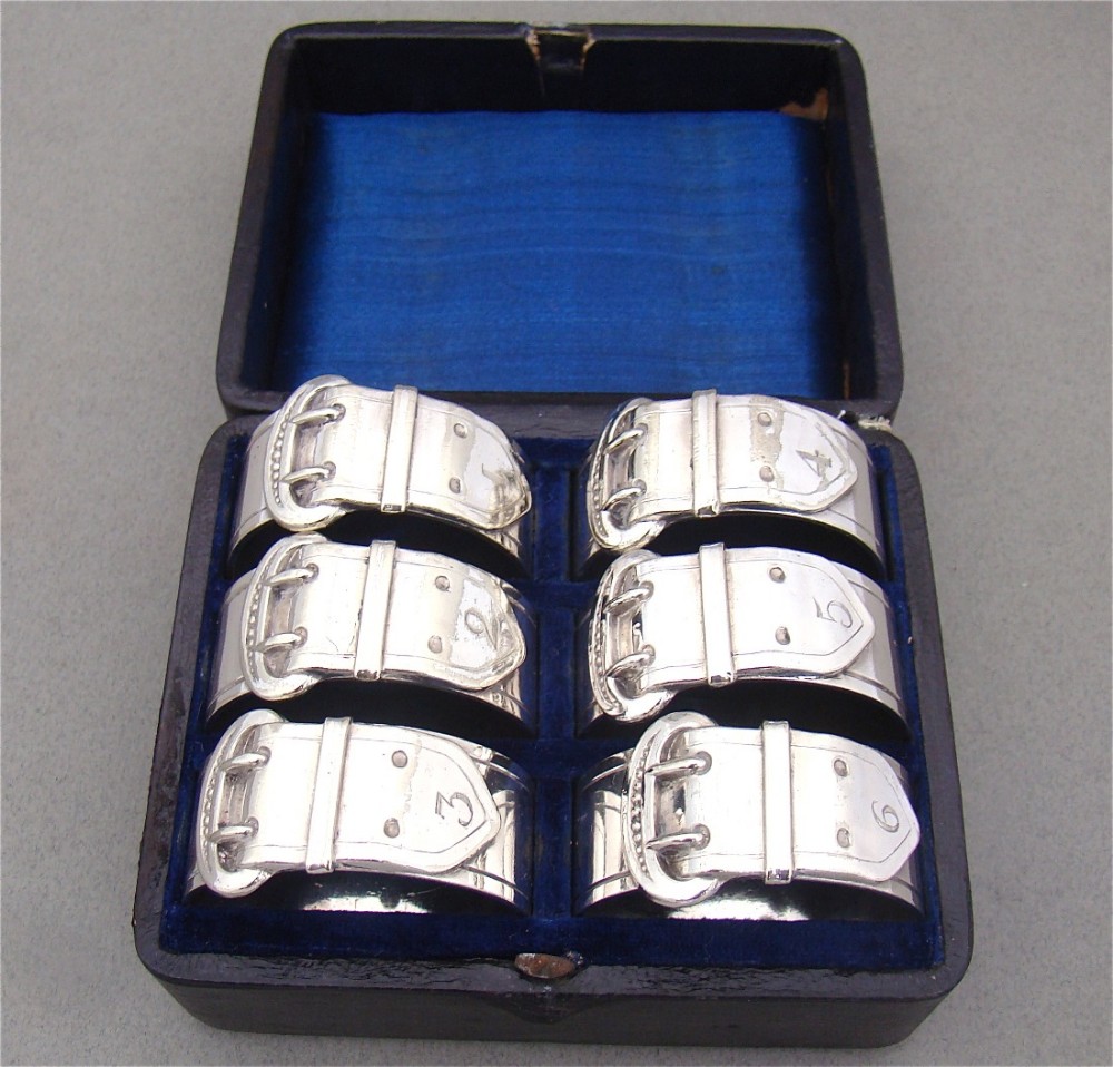 CASED SET OF SIX VICTORIAN SILVER PLATED NUMBERED NAPKIN RINGS, CIRCA 1890