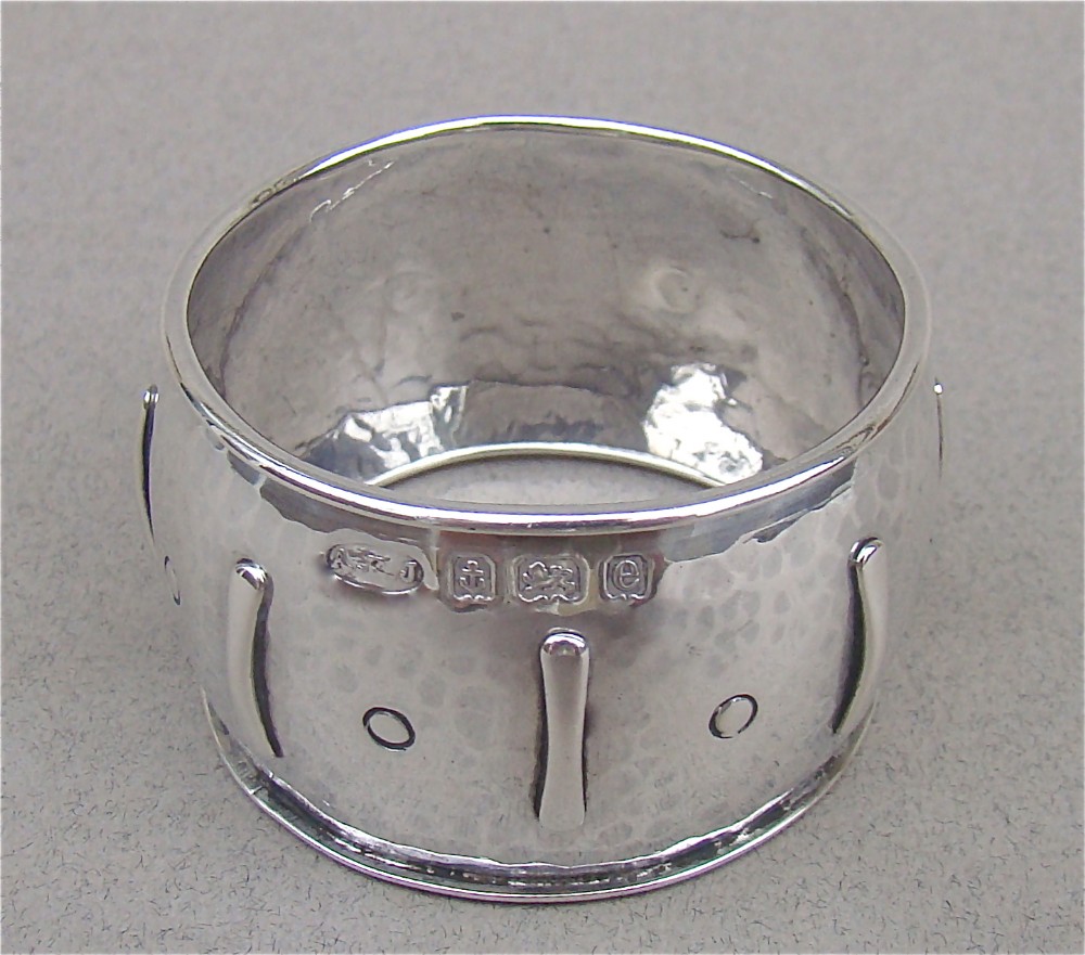 ARTS & CRAFT SILVER NAPKIN RING BY A.E. JONES, BIRMINGHAM 1904