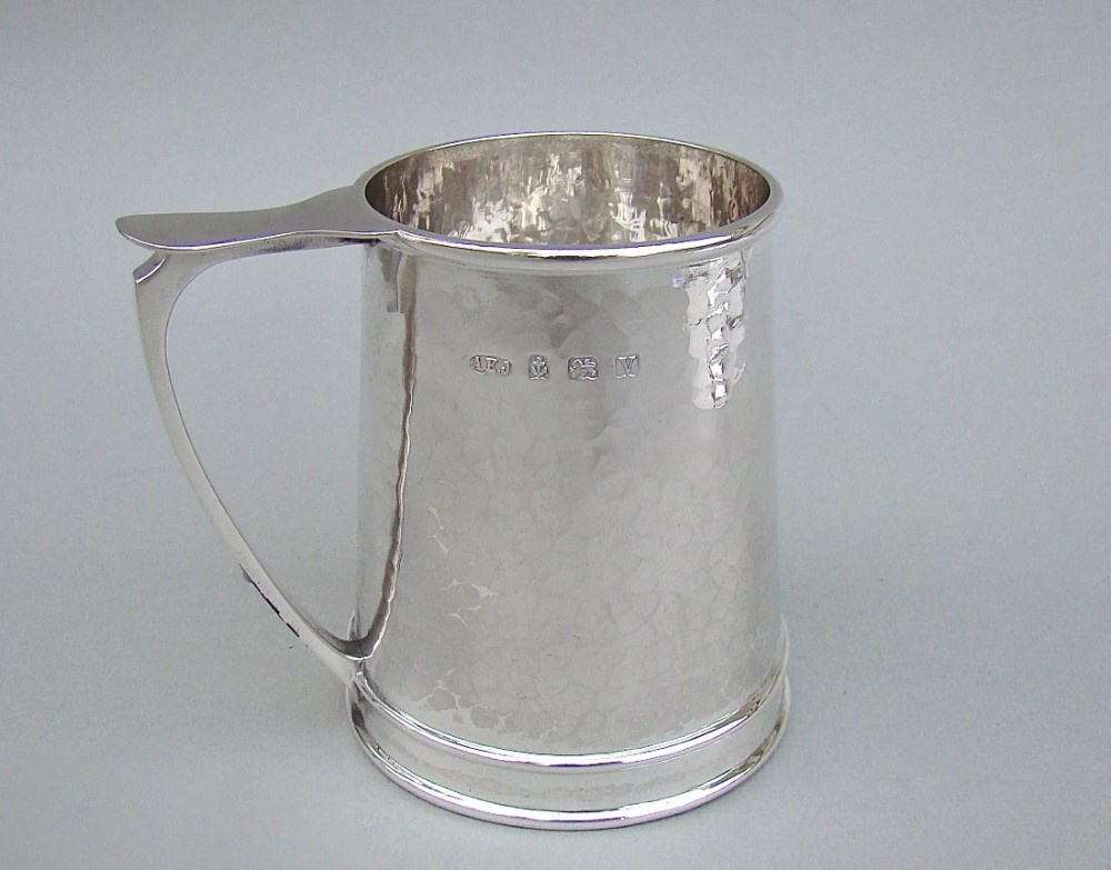 ARTS & CRAFT SILVER CHRISTENING MUG BY A E JONES, BIRMINGHAM 1920