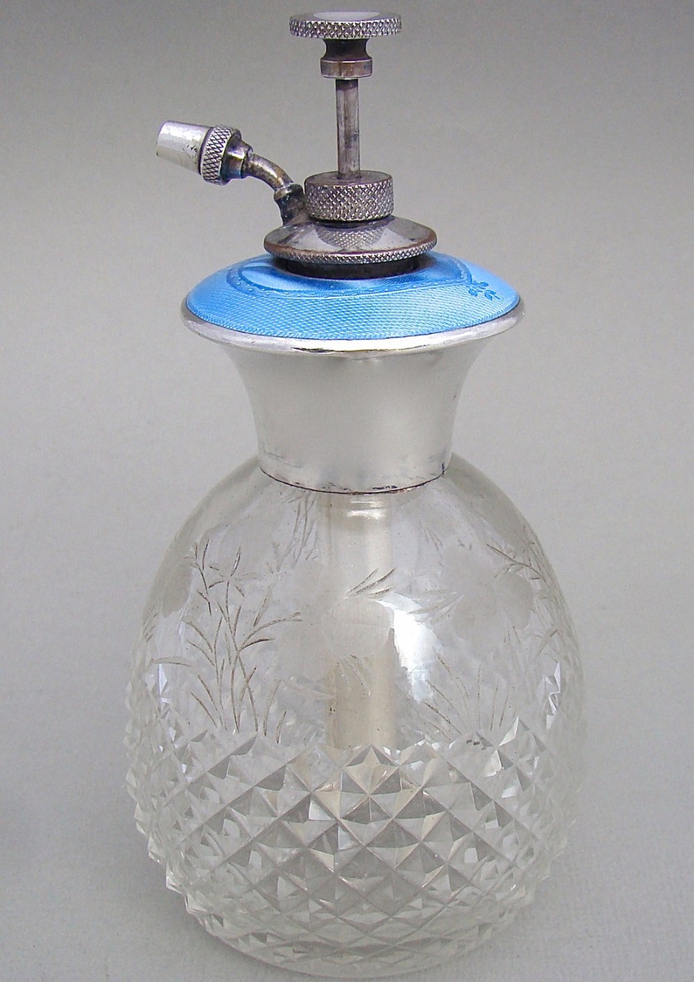 ART DECO STERLING SILVER, GUILLOCHE ENAMEL AND CRYSTAL GLASS ATOMISER, CIRCA 1930