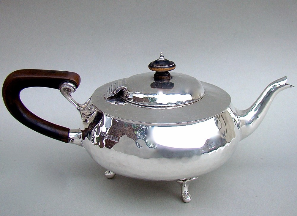 ARTS & CRAFT SPOT-HAMMERED SILVER TEAPOT BY CHARLES EDWARD, LONDON 1918