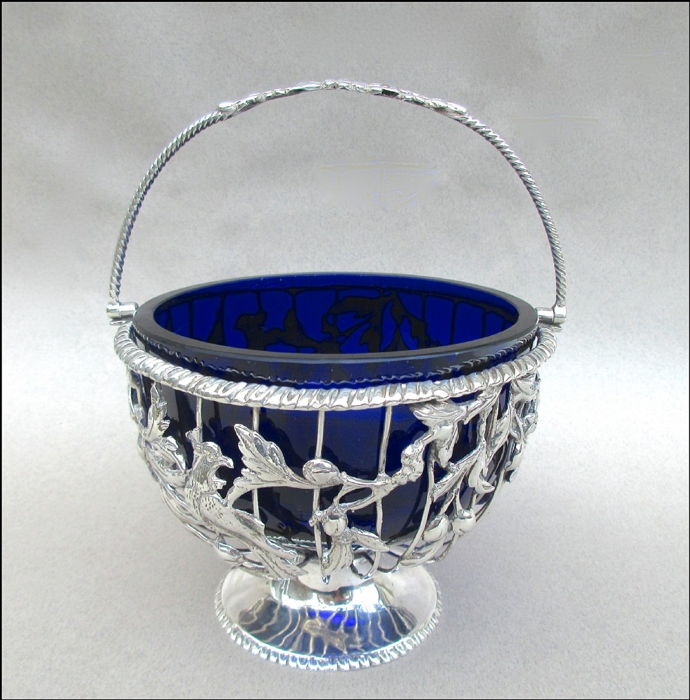 GEORGIAN SILVER WIREWORK SUGAR BASKET BY THOMAS PITT, LONDON 1769 View II