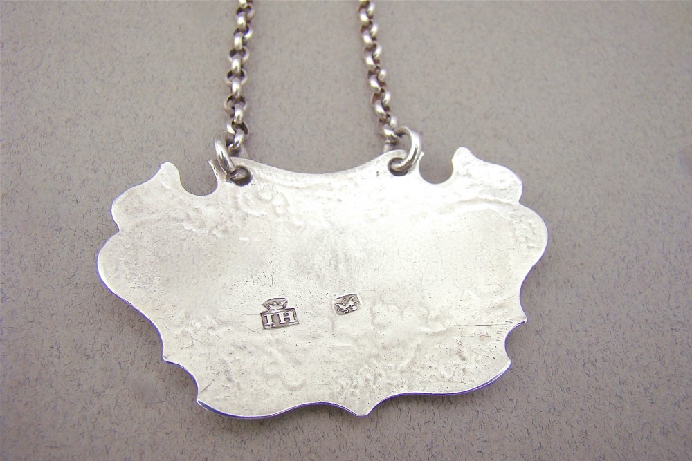 GEORGE II ESCUTCHEON WHITE WINE LABEL BY JOHN HARVEY, LONDON CIRCA 1740 View III