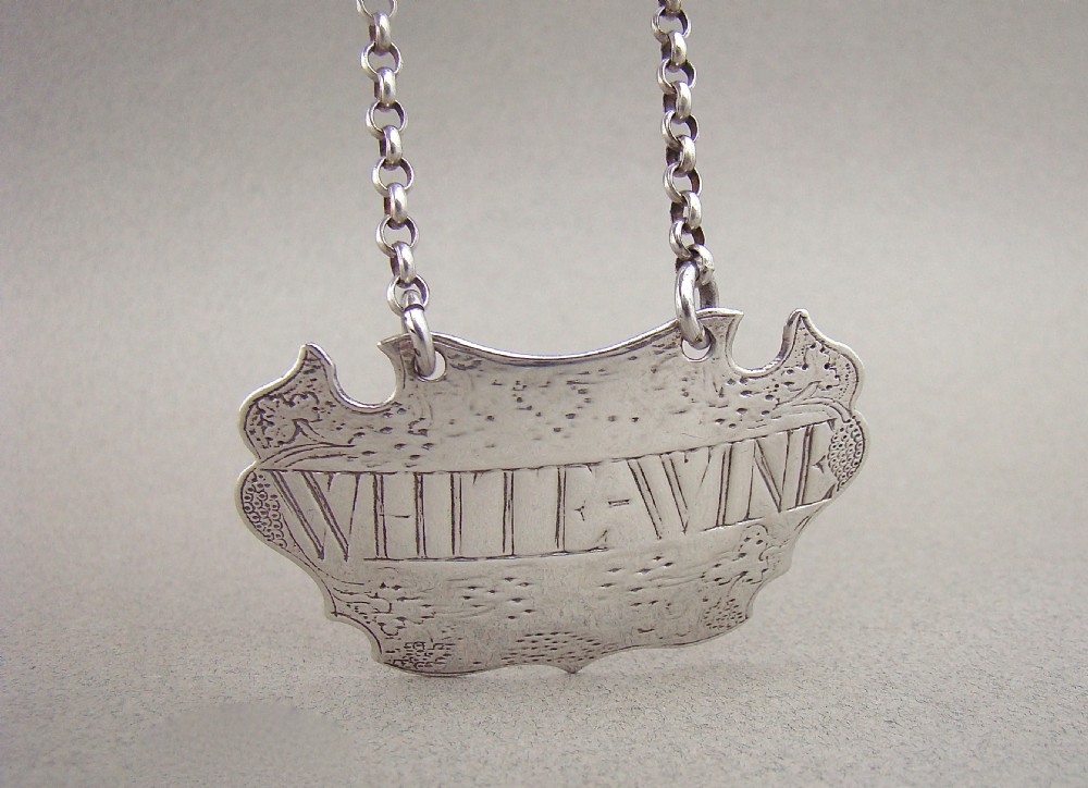 GEORGE II ESCUTCHEON WHITE WINE LABEL BY JOHN HARVEY, LONDON CIRCA 1740 View IV