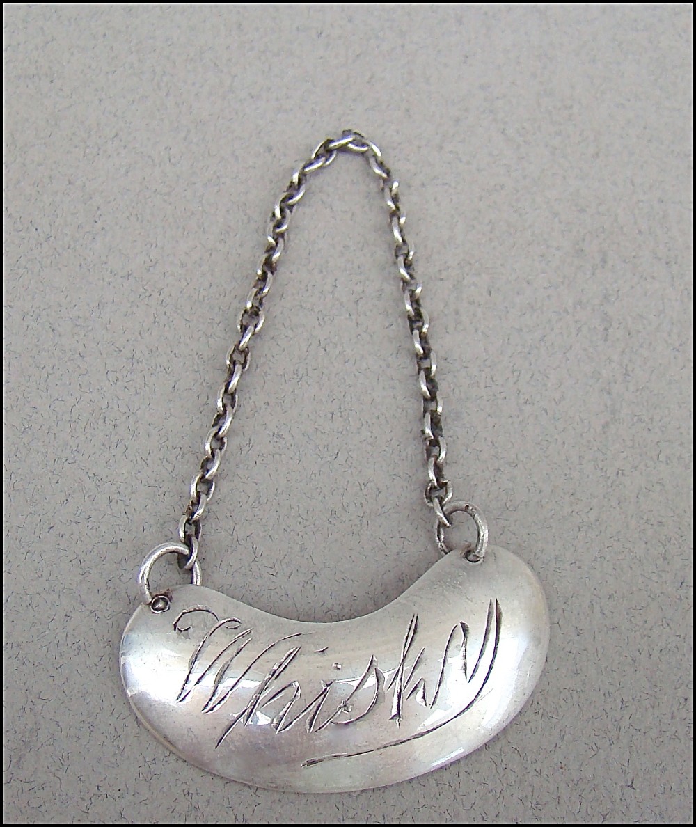 GEORGE IV SILVER WHISKY TOT LABEL BY S BLANCKENSEE & SONS, CHESTER 1937