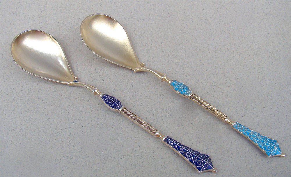 PAIR OF SILVER GILT & CLOISONNÉ ENAMEL PRESERVE SPOONS BY MARIUS HAMMER, NORWAY, CIRCA 1900