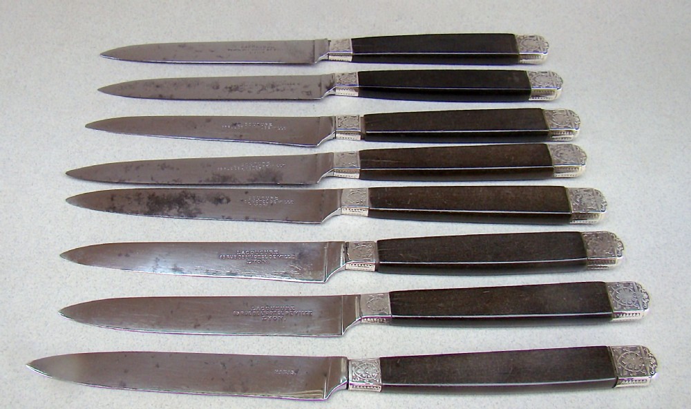 SET OF EIGHT 19TH C. FRENCH DESSERT KNIVES WITH WOOD HANDLES, SILVER FERRULES AND STEEL BLADES, CIRCA 1890
