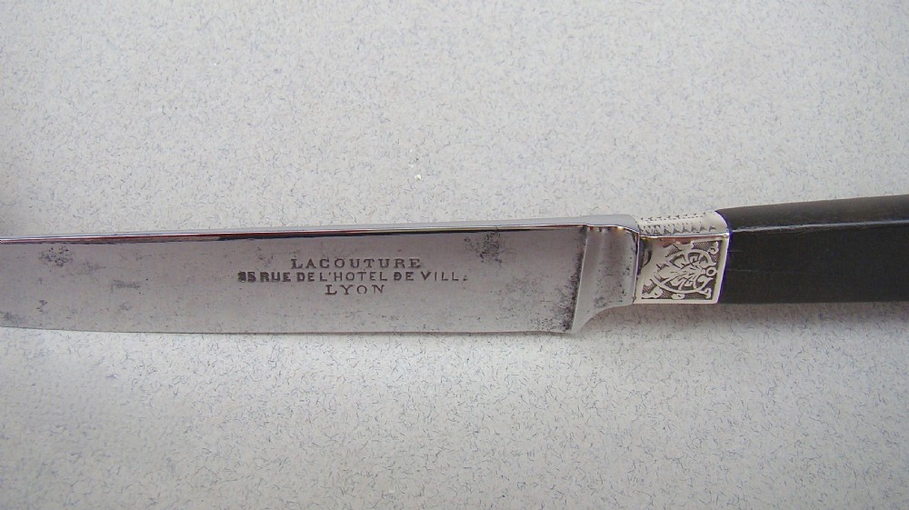 SET OF EIGHT 19TH C. FRENCH DESSERT KNIVES WITH WOOD HANDLES, SILVER FERRULES AND STEEL BLADES, CIRCA 1890
 View III