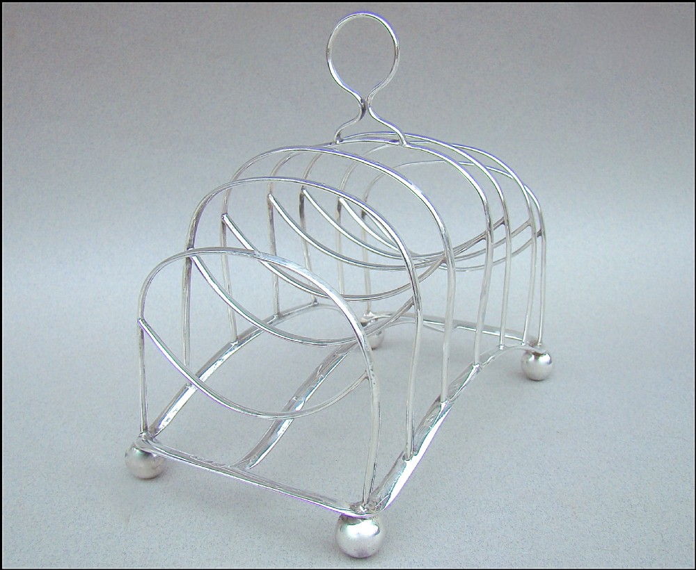 GEORGIAN SILVER TOAST RACK, SHEFFIELD 1811