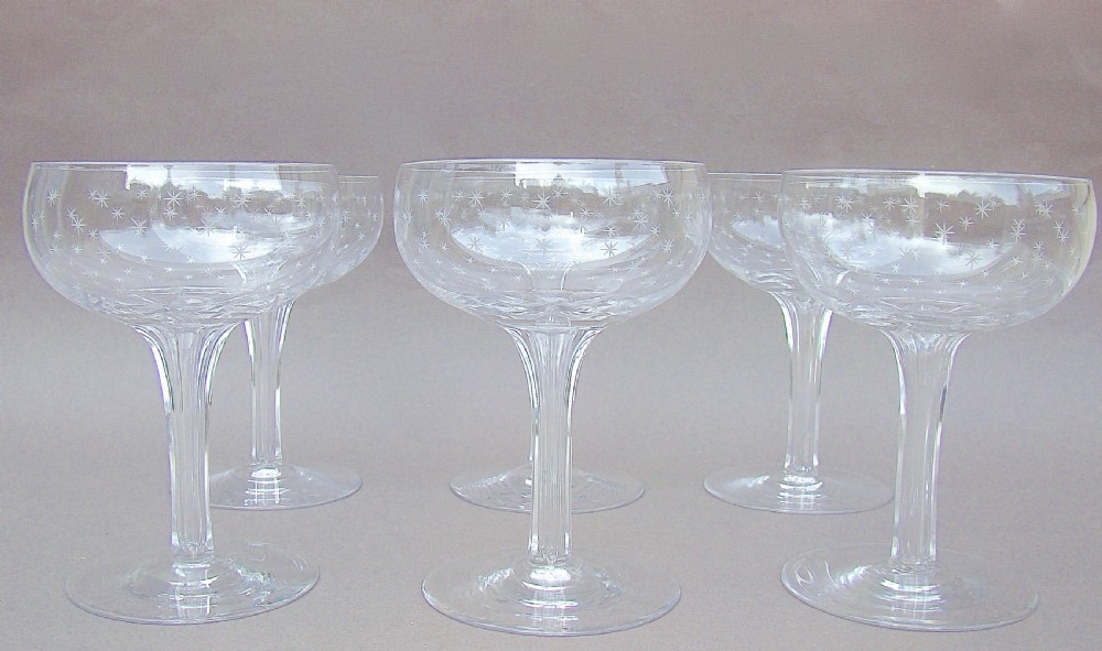 SET OF SIX VICTORIAN STAR-ETCHED HOLLOW STEM CHAMPAGNE GLASSES, CIRCA 1880