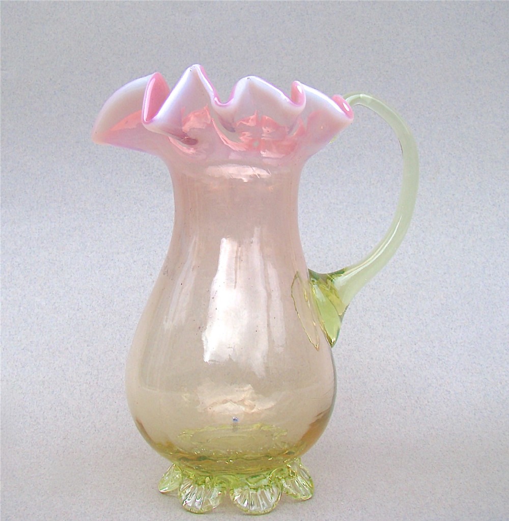 VICTORIAN DUAL COLOUR VASELINE GLASS CREAM JUG, CIRCA 1890