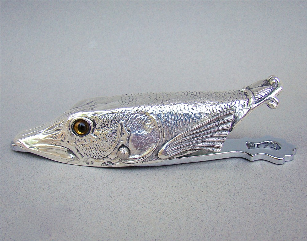 NOVELTY SILVER PLATED PAPER CLIP MODELLED AS A PIKE , CIRCA 1920