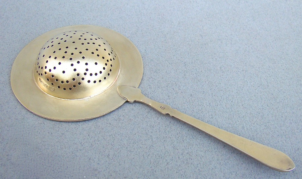 ART DECO SILVER GILT & GUILLOCHE ENAMEL TEA STRAINER BY HENRY JAMES HULBERT, LONDON 1923 View II