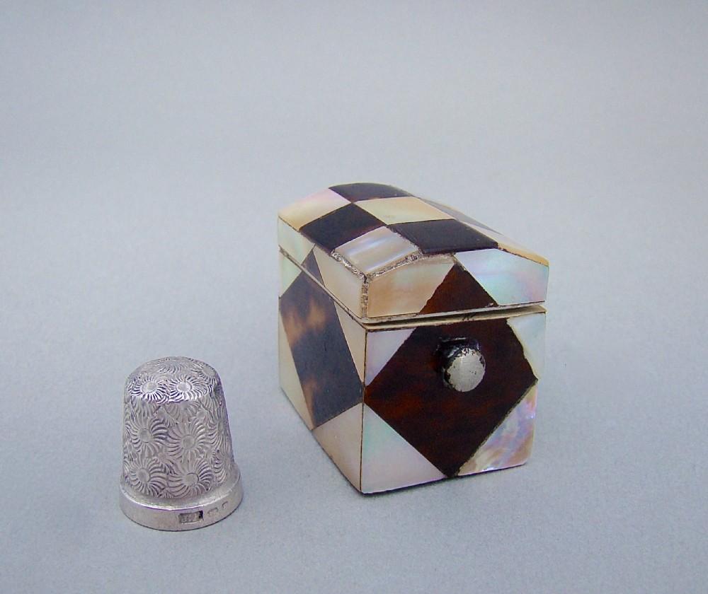 VICTORIAN SILVER THIMBLE FITTED IN MOTHER OF PEARL & TORTOISESHELL CASE, CIRCA 1860