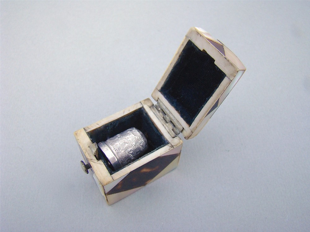 VICTORIAN SILVER THIMBLE FITTED IN MOTHER OF PEARL & TORTOISESHELL CASE, CIRCA 1860 View IV