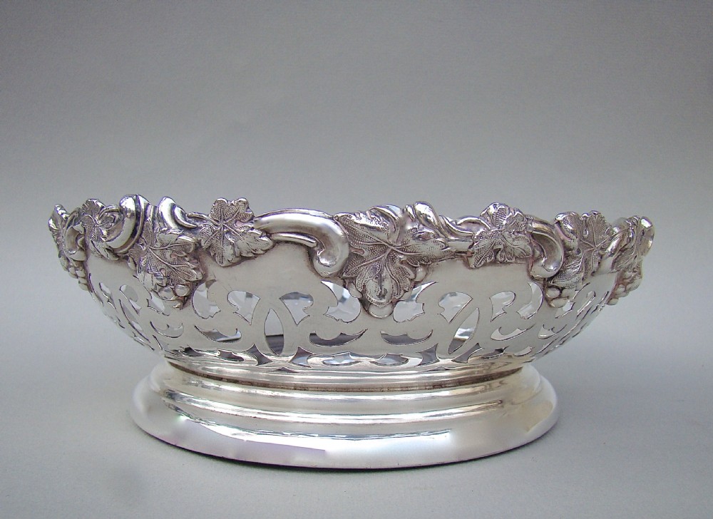 VICTORIAN SILVER PLATED PIERCED WINE COASTER, CIRCA 1890 View III