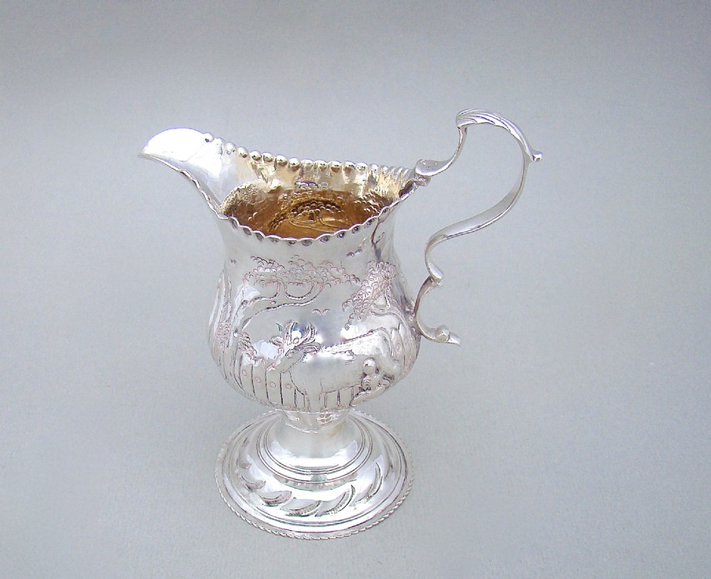 GEORGIAN SILVER CREAM JUG, LONDON 1776