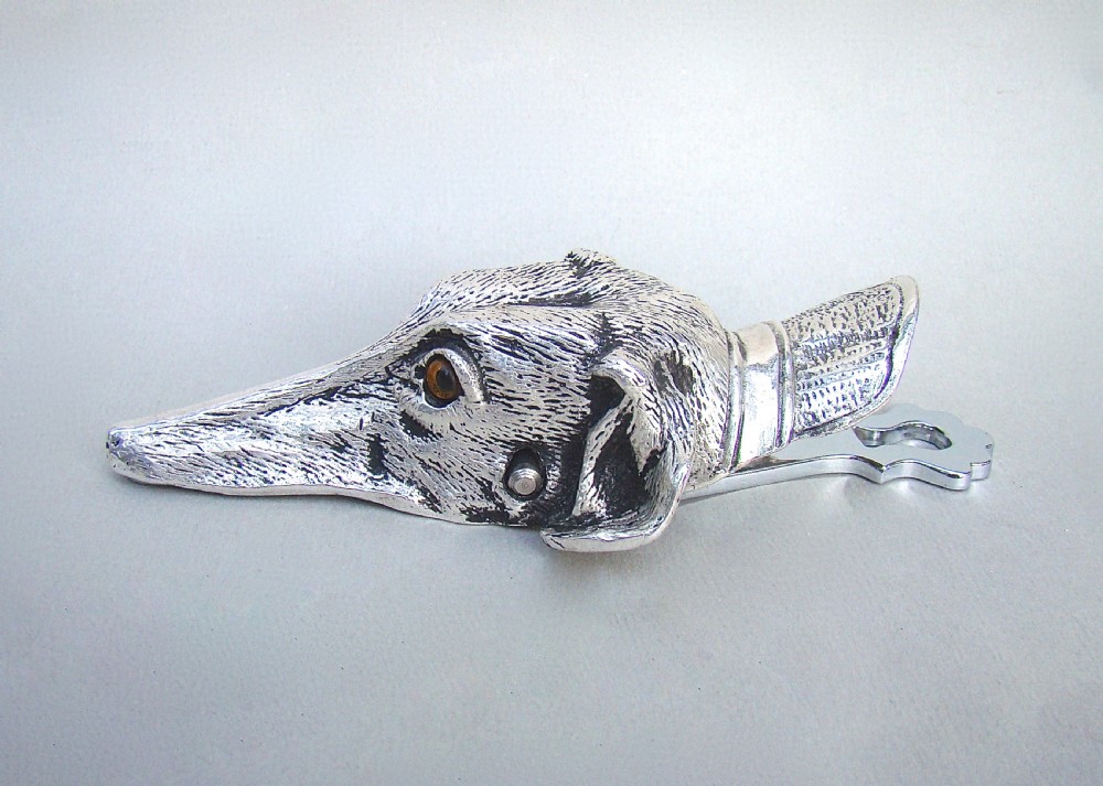 NOVELTY SILVER PLATED PAPER CLIP IN THE SHAPE OF A DOG'S HEAD, CIRCA 1920 View II