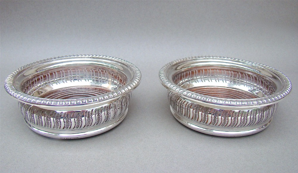 SUPERB PAIR OF MID 20TH CENTURY SOLID SILVER WINE COASTERS BY MAPPIN & WEBB, BIRMINGHAM 1968.

