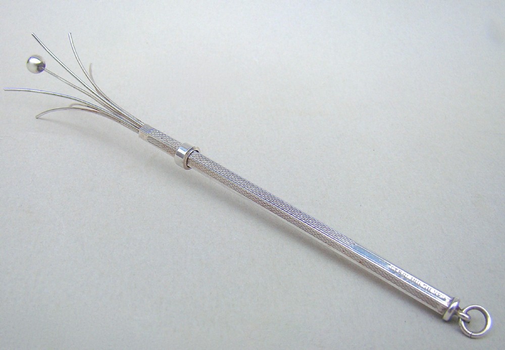 ART DECO SILVER COCKTAIL SWIZZLE STICK, CIRCA 1930