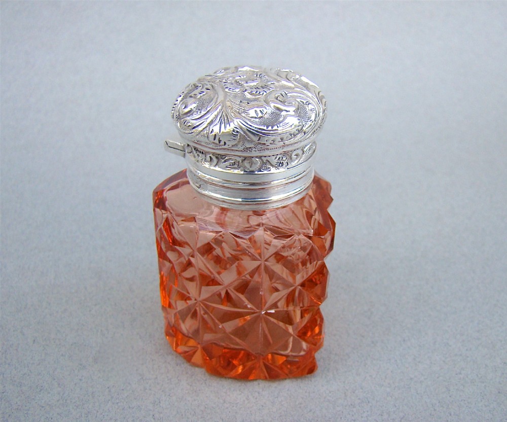 UNUSUAL VICTORIAN SILVER & CUT GLASS HEART-SHAPED SCENT BOTTLE , CIRCA 1895 View V