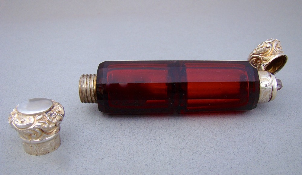 VICTORIAN SILVER GILT RUBY GLASS DOUBLE-ENDED SCENT BOTTLE, CIRCA 1880

 View III