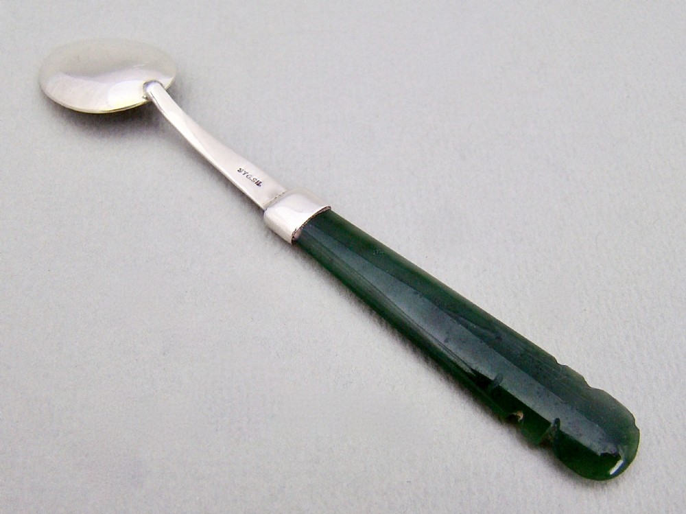 NEW ZEALAND STERLING SILVER AND CARVED JADE SMALL SPOON, CIRCA 1920 View II