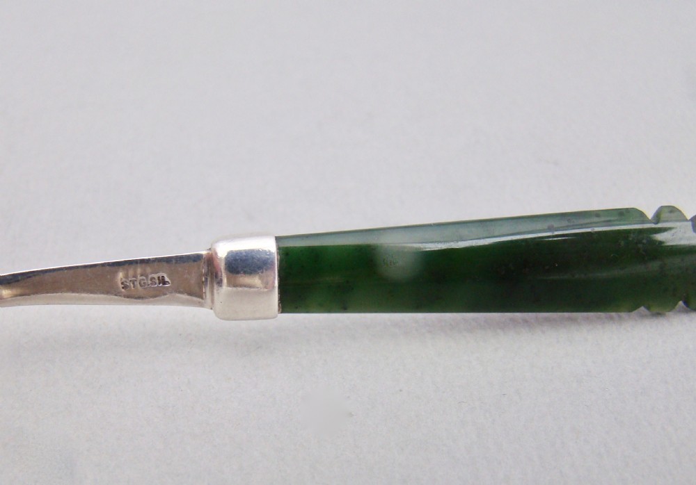 NEW ZEALAND STERLING SILVER AND CARVED JADE SMALL SPOON, CIRCA 1920 View V