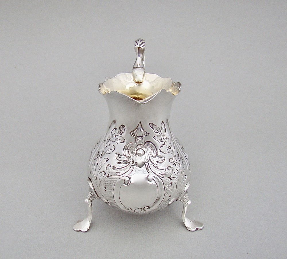 GEORGIAN ROCOCO SILVER CREAM JUG , LONDON 1760