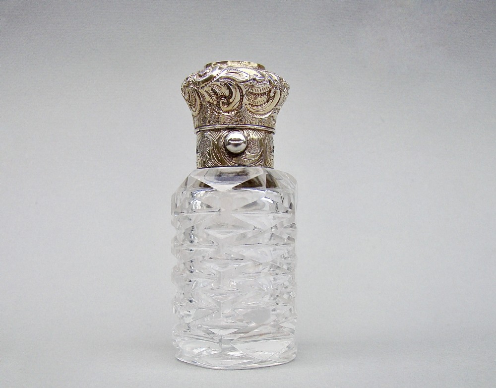 FABULOUS VICTORIAN SILVER GILT AND CUT GLASS SCENT BOTTLE, CIRCA 1870