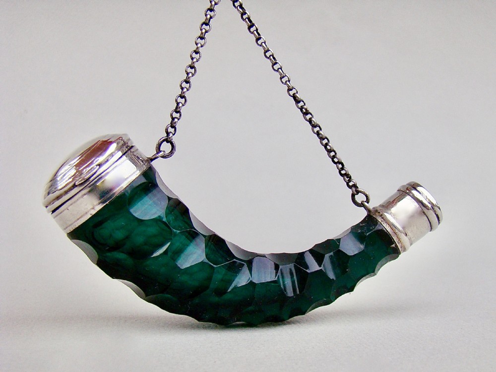 VICTORIAN SILVER CORNUCOPIA BRISTOL GREEN CUT GLASS SCENT BOTTLE, CIRCA 1870