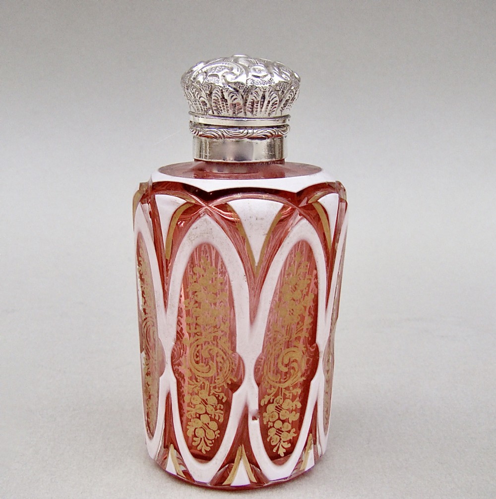 FABULOUS VICTORIAN SILVER AND BOHEMIAN OVERLAY CRANBERRY GLASS  SCENT BOTTLE, CIRCA 1890