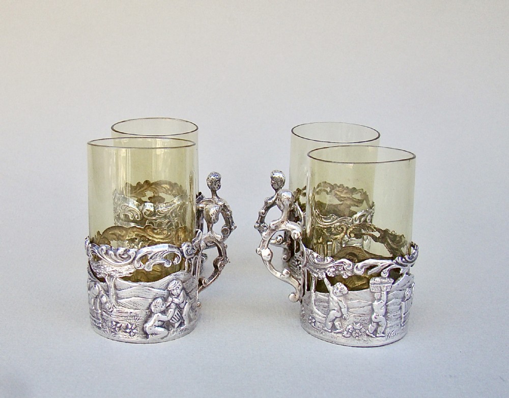 DELIGHTFUL SET OF FOUR VICTORIAN SILVER & AMBER GLASS TEA HOLDERS BY WILLIAM COMYNS, LONDON 1889