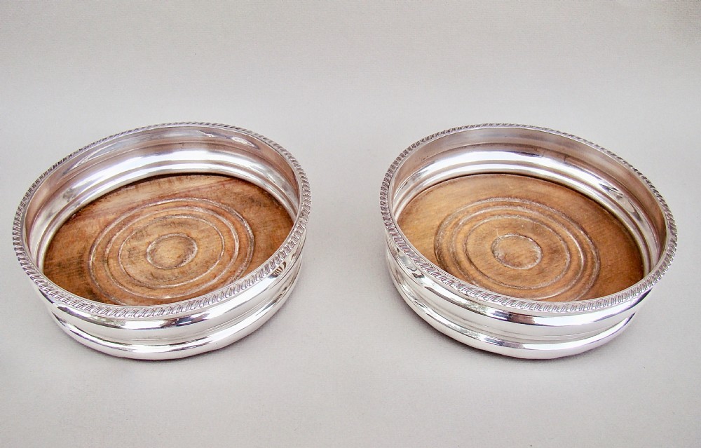 PAIR OF TURN OF THE CENTURY SILVER PLATED WINE COASTERS, CIRCA 1900 View II