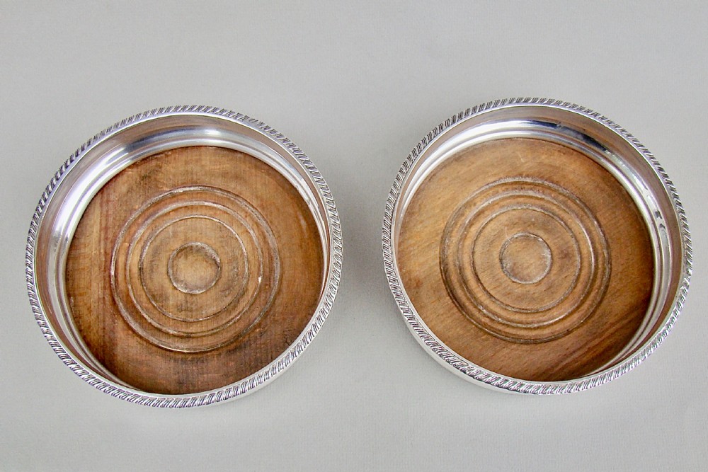 PAIR OF TURN OF THE CENTURY SILVER PLATED WINE COASTERS, CIRCA 1900 View IV