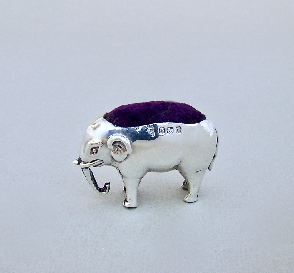 SMALL EDWARDIAN STERLING SILVER ELEPHANT PIN CUSHION BY THE BOOTS COMPANY, BIRMINGHAM 1908
