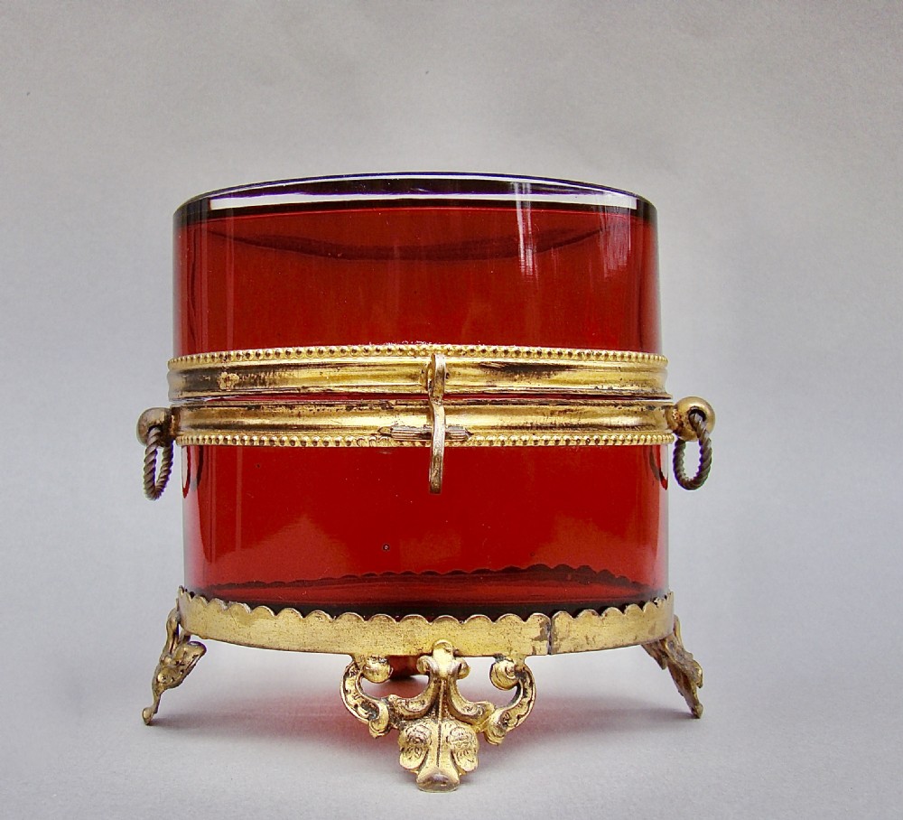 FRENCH PALAIS ROYAL RUBY GLASS CASKET WITH GILT ORMULU MOUNTS, CIRCA 1860