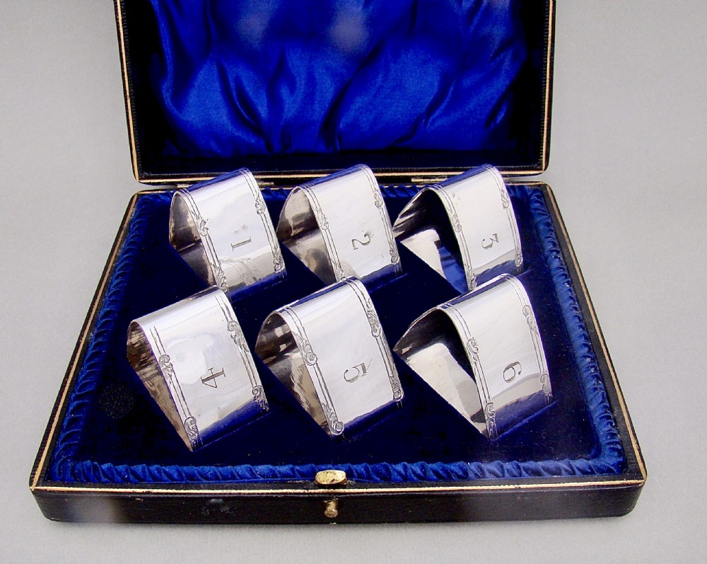 SET OF SIX EDWARDIAN SILVER PLATED NUMBERED NAPKIN RINGS, CIRCA 1900
 View II