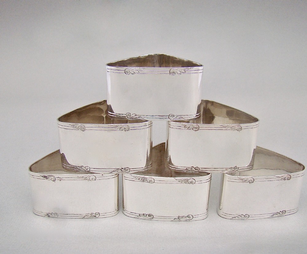 SET OF SIX EDWARDIAN SILVER PLATED NUMBERED NAPKIN RINGS, CIRCA 1900
 View IV